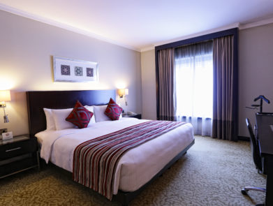 Executive-Suite-Bedroom-2-391x295
